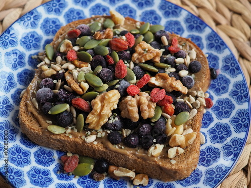 Sandwich with berries and nuts