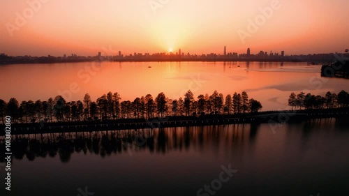 City Landmark Aerial video of evening sunset at Wuhan East Lake Mushan 5A scenic spot photo