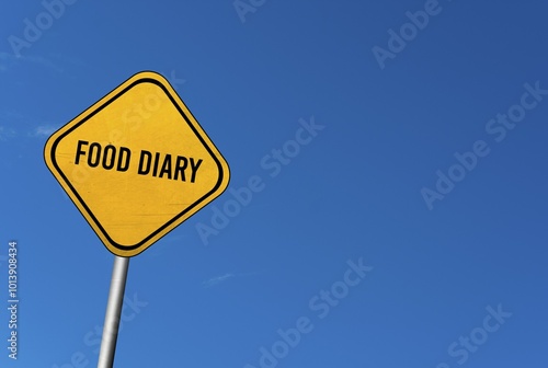 Food diary, yellow sign with blue sky