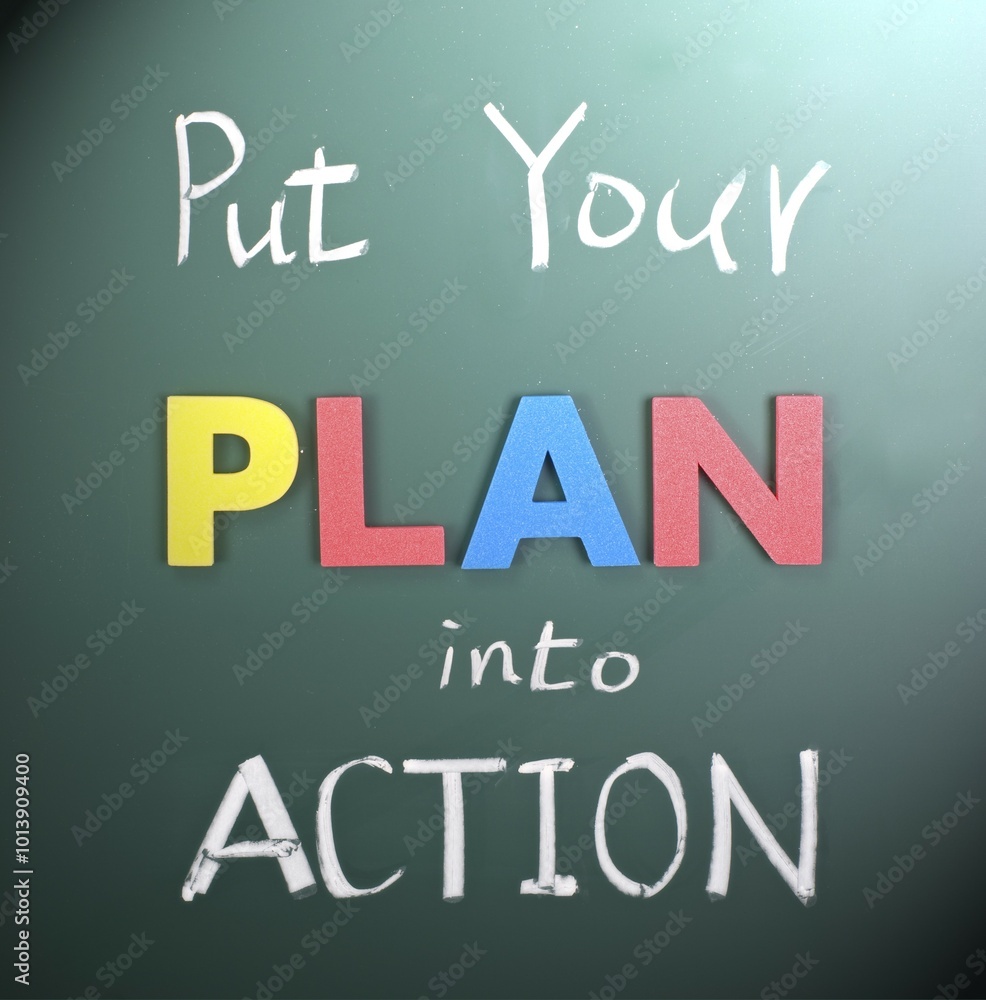 Put your plan into action, words on blackboard Put your plan into action, words on blackboard