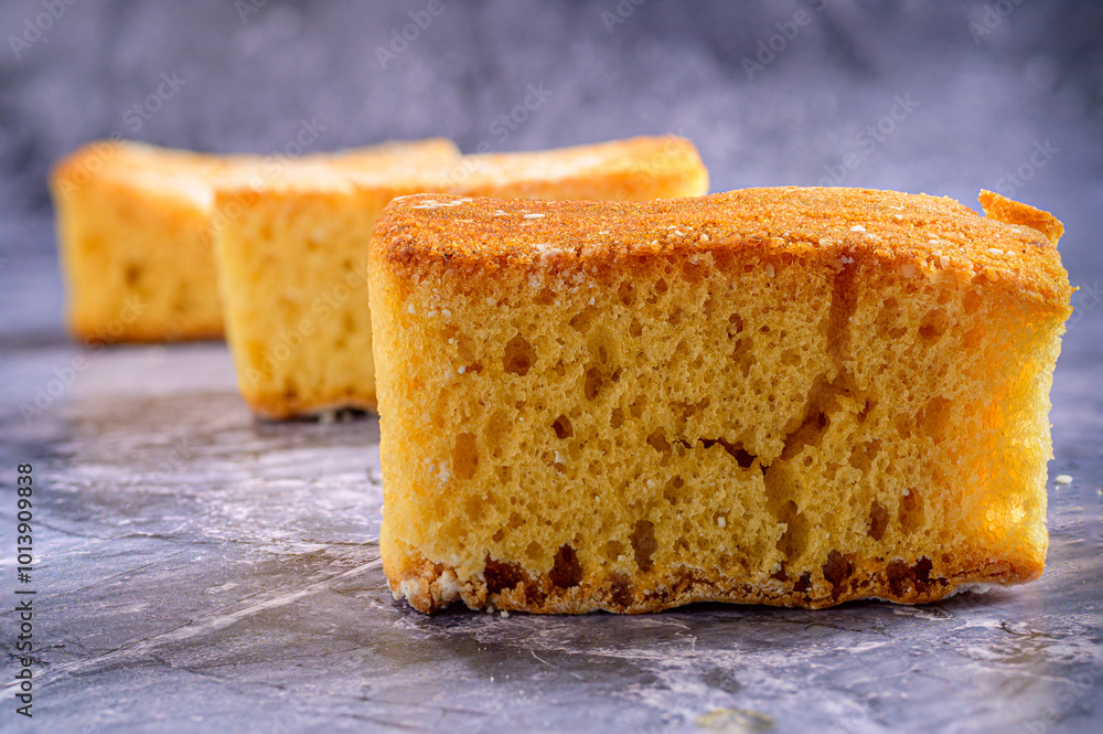 Three Sponge Cake Slices on Marble Surface Three Sponge Cake Slices on Marble Surface