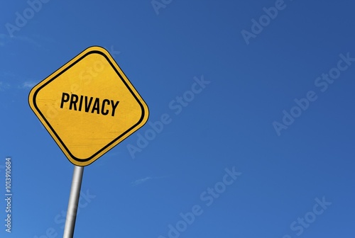 Privacy, yellow sign with blue sky