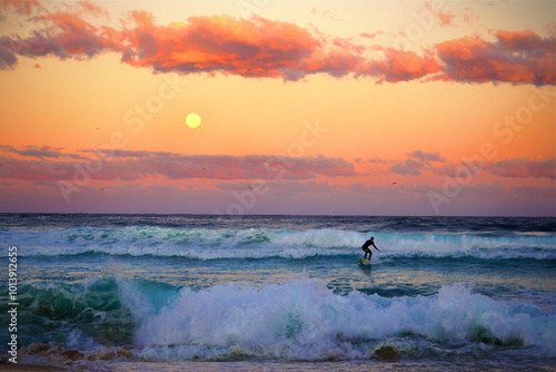 surfer at sunset