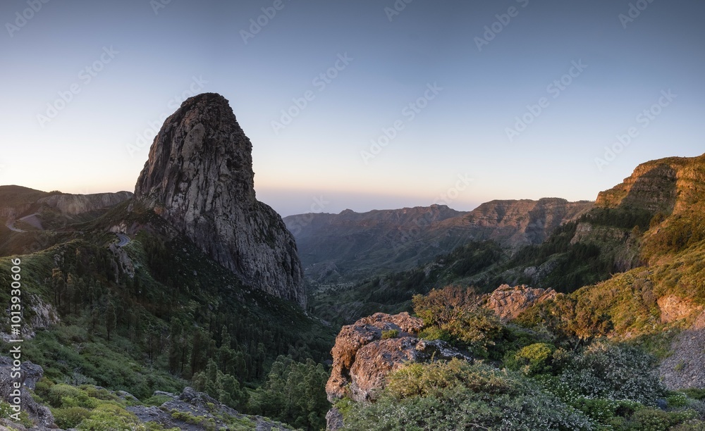 Fototapeta premium Roque de Agando rock tower at sunrise, Monumento Natural de los Roques, La Gomera, Canary Islands, Spain, Europe