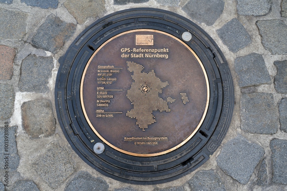 Manhole covers as a GPS reference point on the Hauptmarkt square, Nuremberg, Middle Franconia, Bavaria, Germany, Europe Manhole covers as a GPS reference point on the Hauptmarkt square, Nuremberg, Middle Franconia, Bavaria, Germany, Europe