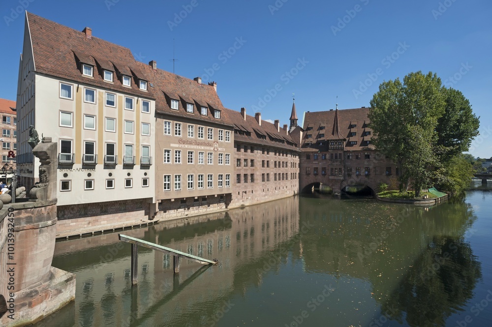 Obraz premium Heilig Geist Spital, hospital beside Pegnitz, Nuremberg, Middle Franconia, Bavaria, Germany, Europe