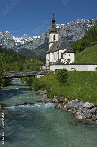 Parish church St. Sebastian with Ramsauer Ache, at back Reiteralpe, Ramsau, Berchtesgadener Land, Upper Bavaria, Germany, Europe photo