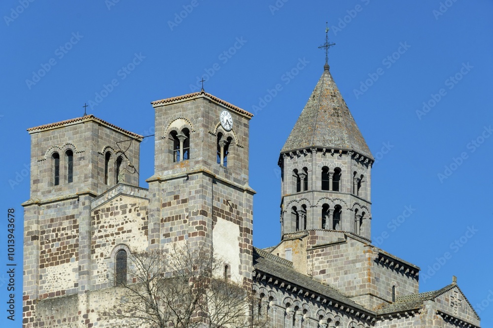 Romanesque church of Saint Nectaire, Puy de Dome departement, Auvergne-Rhone-Alpes, France, blue sky, bricks, Europe Romanesque church of Saint Nectaire, Puy de Dome departement, Auvergne-Rhone-Alpes, France, blue sky, bricks, Europe