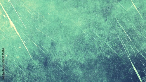 A textured abstract background showcasing a blend of green hues with subtle scratches and imperfections, perfect for creative designs.
