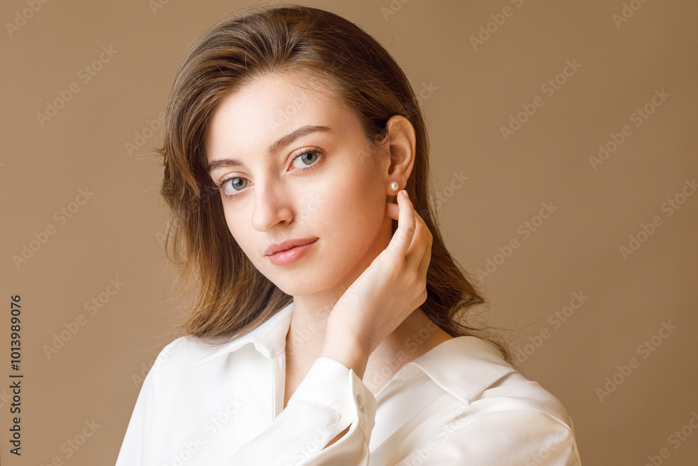 Beautiful young girl with jewelry. Studio portrait Beautiful young girl with jewelry. Studio portrait