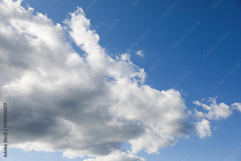 Picturesque view of blue sky with fluffy clouds Picturesque view of blue sky with fluffy clouds