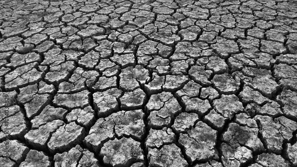 broken and cracked lands caused by drought, lands split open by thirst,