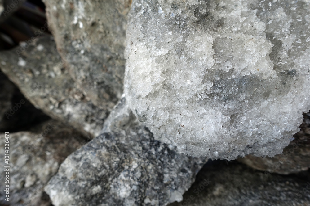 natural rock salt extracted from underground, close-up view of a large piece of rock salt,
