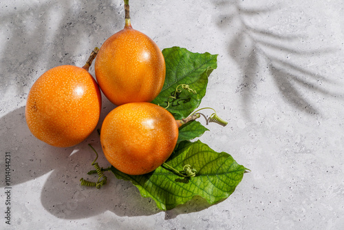 fresh passion fruit, Passiflora ligularis, sweet granadilla or grenadia photo