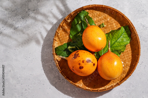 fresh passion fruit, Passiflora ligularis, sweet granadilla or grenadia photo