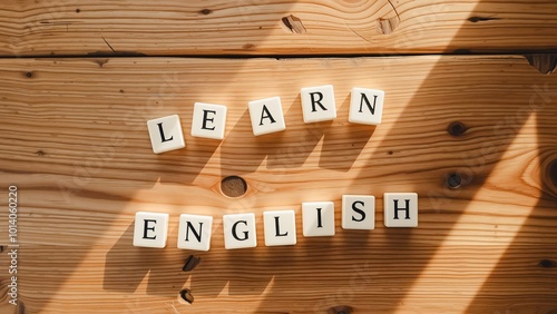 Learn English - Scrabble Tiles on Rustic Wood, Close-up image of Scrabble tiles spelling 