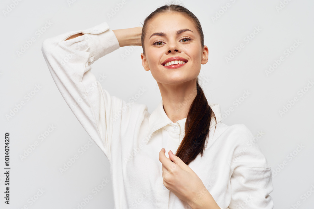 smiling young woman with long hair, white shirt, light background, cheerful expression, casual style, happy mood captured in a natural pose showcasing confidence and beauty smiling young woman with long hair, white shirt, light background, cheerful expression, casual style, happy mood captured in a natural pose showcasing confidence and beauty