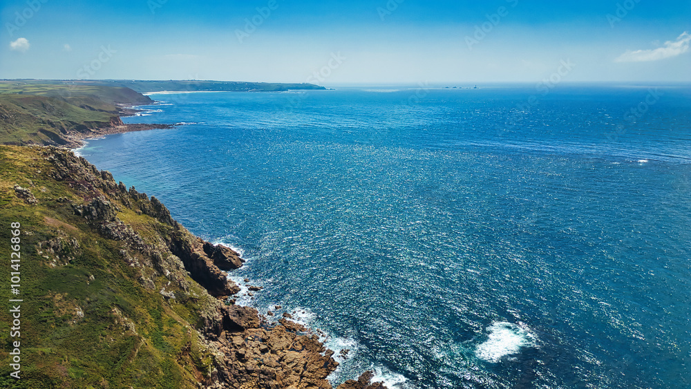 Scenic Coastal View with Cliffs and Ocean in Cornwall, UK Scenic Coastal View with Cliffs and Ocean in Cornwall, UK