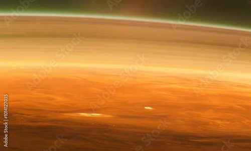 Saturn’s moon Titan with its thick, orange atmosphere. Video