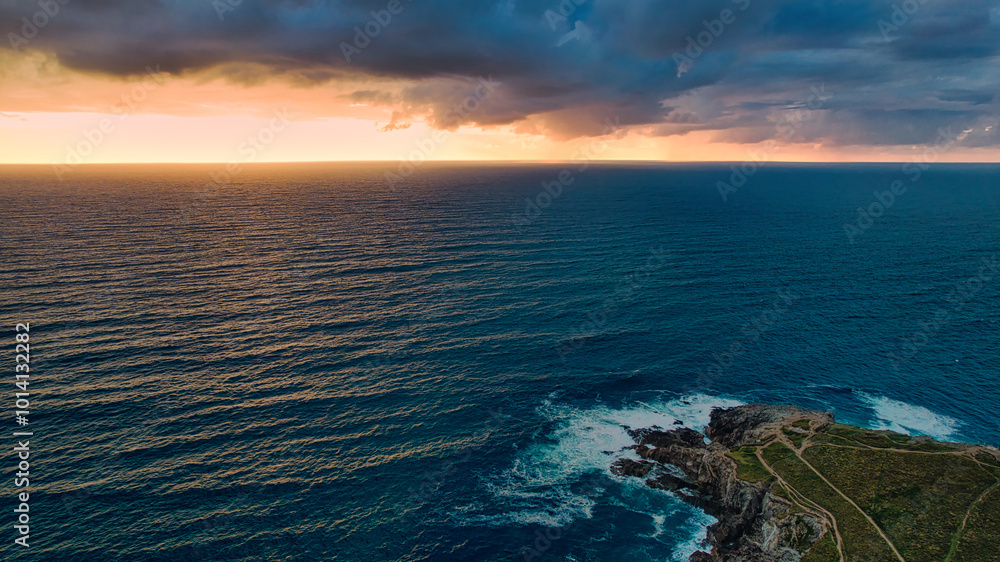 Obraz premium Stunning Sunset Over Coastal Landscape at Little Fistral Beach, Newquay, UK
