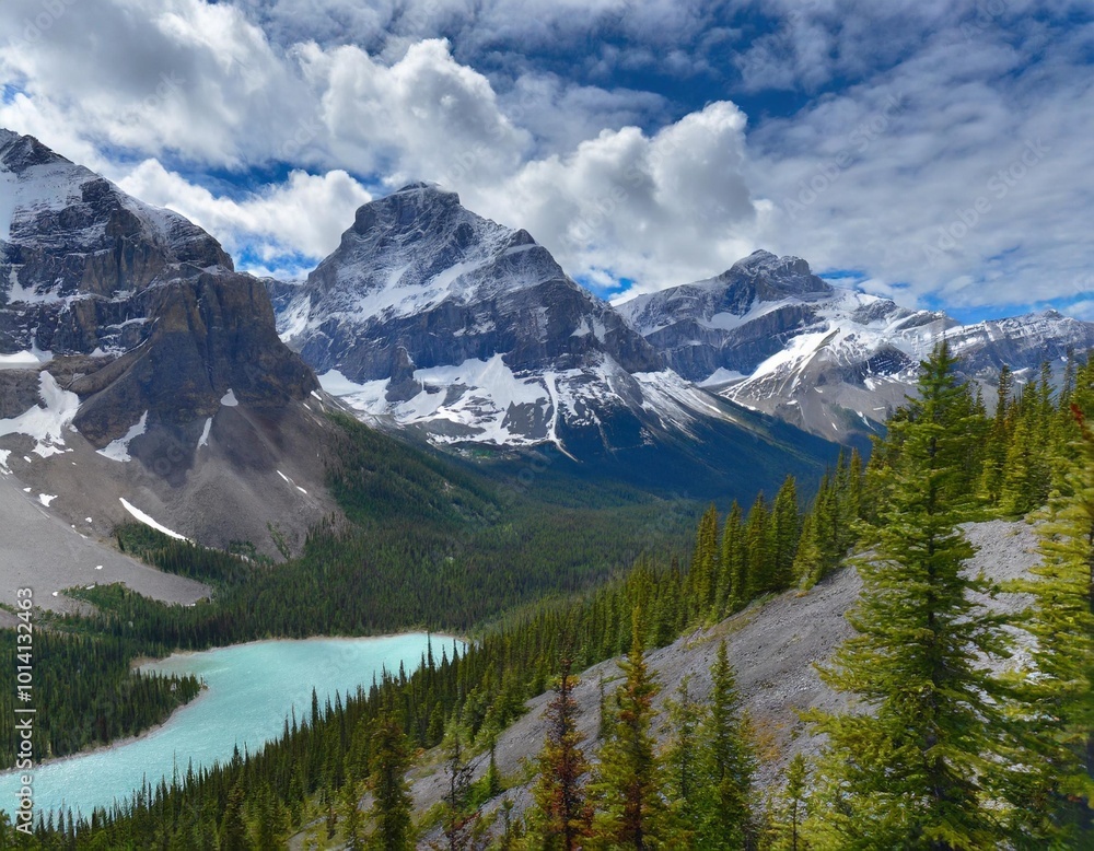 The Majestic Rocky Mountains in Canada, Featuring Snow-Capped Peaks, Crystal-Clear Lakes, and Expansive Pine Forests, Offering a Haven for Outdoor Enthusiasts, Hikers, and Nature Lovers The Majestic Rocky Mountains in Canada, Featuring Snow-Capped Peaks, Crystal-Clear Lakes, and Expansive Pine Forests, Offering a Haven for Outdoor Enthusiasts, Hikers, and Nature Lovers
