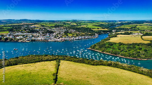 Bild auf Leinwand Aerial View of a Coastal Town with Sailboats in Cornwall, UK