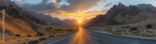 A breathtaking sunset over a tranquil road, surrounded by majestic mountains, perfect for travel and adventure themes.