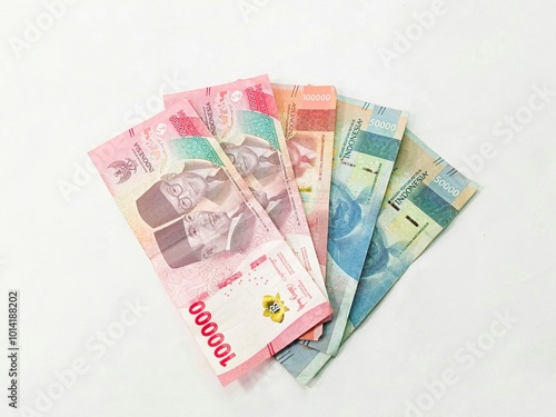 Rupiah banknotes background. Indonesian money isolated on a white background. 50 and 100 thounsand rupiah photo