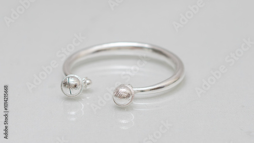 Hmong or Miao handmade silver jewelry on white background