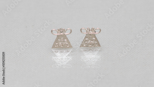 Hmong or Miao handmade silver jewelry on white background photo