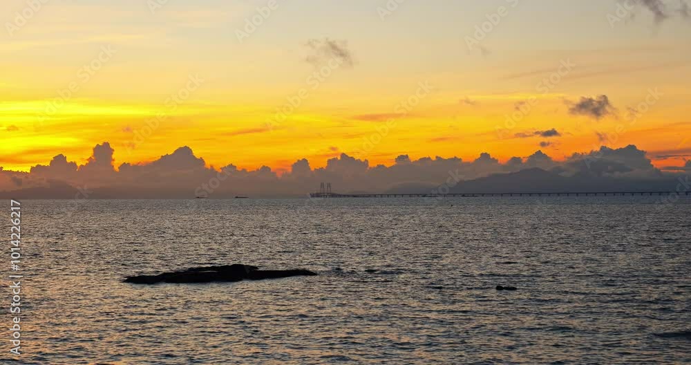 Beautiful coastline and colorful sky clouds natural landscape at dusk in Zhuhai, China. Famous holiday resort.