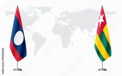Laos and Togo flags for official meeting against background of world map.