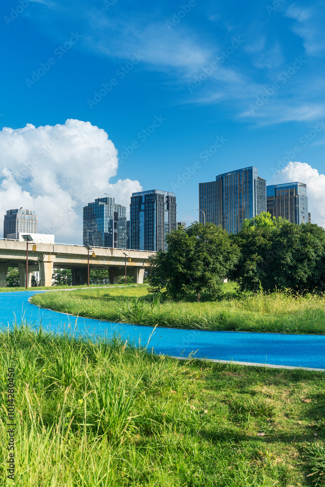 Naklejka premium spring park and modern city