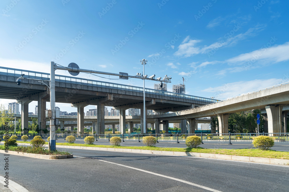 Concrete structure and asphalt road space under the overpass in the city Concrete structure and asphalt road space under the overpass in the city