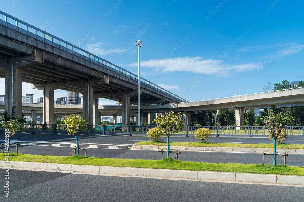 Concrete structure and asphalt road space under the overpass in the city Concrete structure and asphalt road space under the overpass in the city