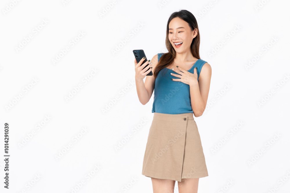 Beautiful Asian woman holding smartphone and smiling on white background. Beautiful Asian woman holding smartphone and smiling on white background.