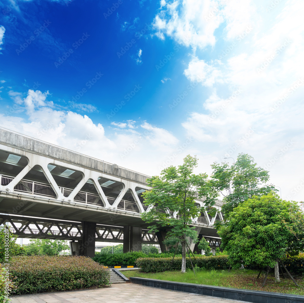 Fototapeta premium Pedestrian bridge against blue sky