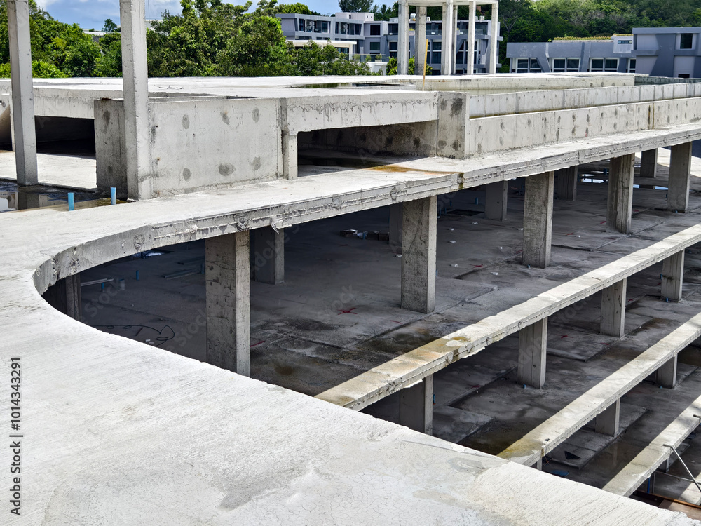 Large building with a roof pool of water under construction Large building with a roof pool of water under construction