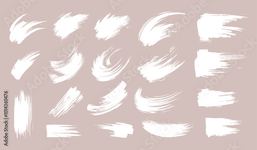 Set of Ink brush stroke silhouettes in various shapes and sizes