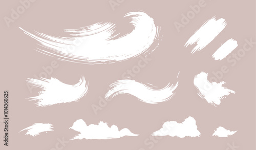 Set of Ink brush stroke silhouettes in various shapes and sizes
