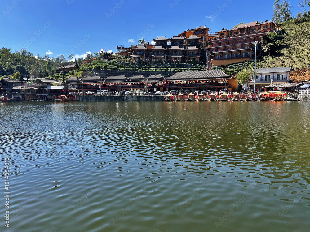 Obraz premium Tranquil Escape: Finding Peace in Ban Rak Thai Lake, Mae Hong Son Loop, Northern Thailand.