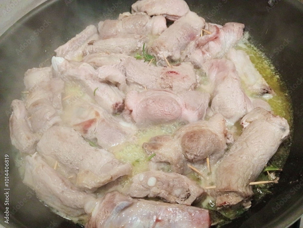 Meat cooking on the pan