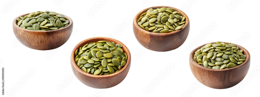 Green Pumpkin seeds in wooden bowl on white background Green Pumpkin seeds in wooden bowl on white background