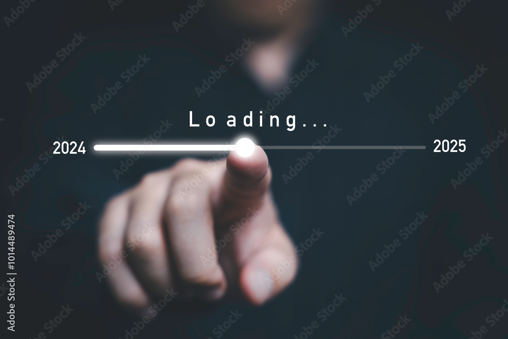 Businessman touching to downloading bar to change 2024 to 2025 year for change and preparation new business year concept. Businessman touching to downloading bar to change 2024 to 2025 year for change and preparation new business year concept.