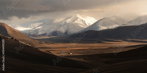 Mountain peak of the tibetan snow-capped mountains, a beautiful panorama of the mountains at sunset of the day 