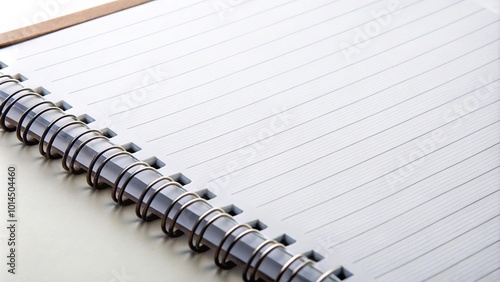 Close-up of blank notepad or notebook paper on white background