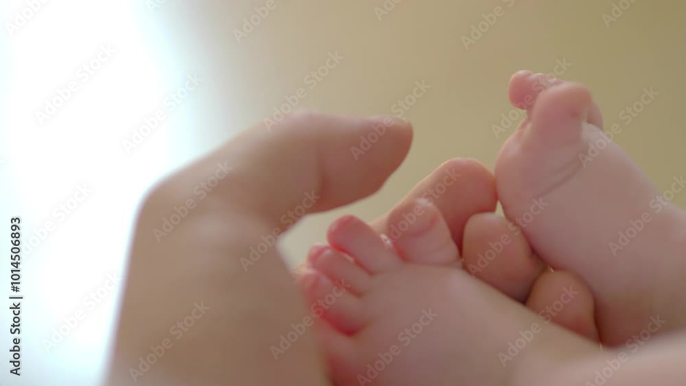 Tiny Feet in Parent's Hands in 4k slow motion 60fps Tiny Feet in Parent's Hands in 4k slow motion 60fps