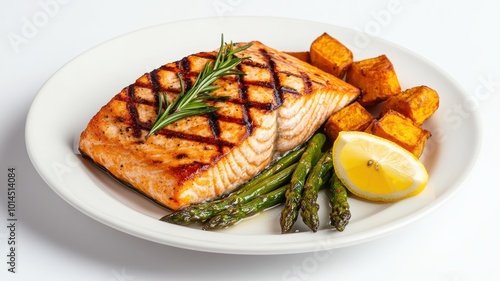 Grilled salmon with vegetables and lemon slice photo