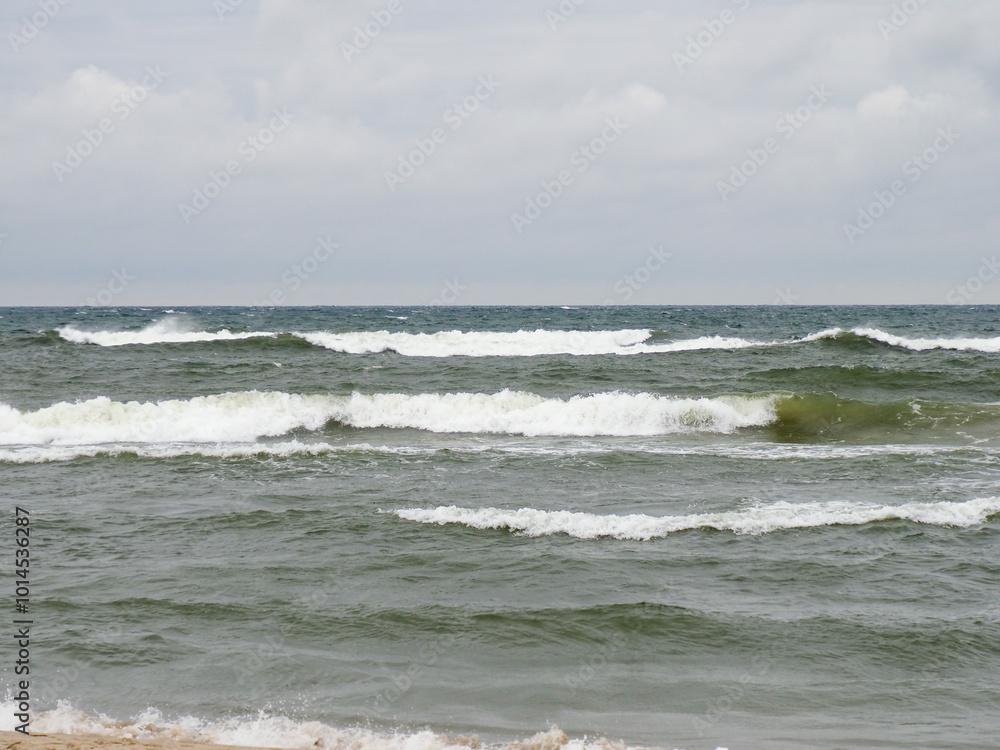 Calming View of Sea Waves Under a Cloudy Sky with No People Present Calming View of Sea Waves Under a Cloudy Sky with No People Present