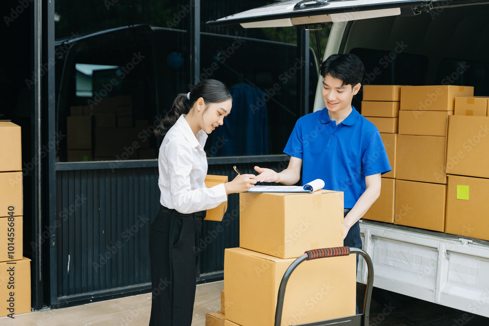 Express Delivery Service. Asian Courier Delivering Package to man Delivery service near van outside the warehouse, delivery home Express Delivery Service. Asian Courier Delivering Package to man Delivery service near van outside the warehouse, delivery home
